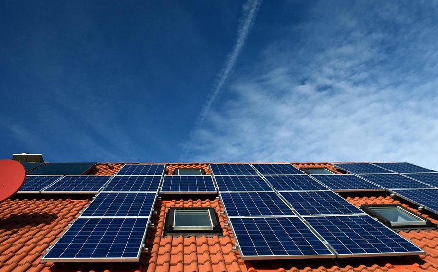 Rooftop solar panels at dusk
