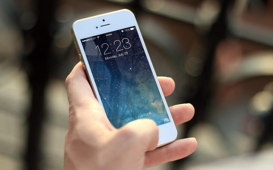 Phone screen with call and WhatsApp apps